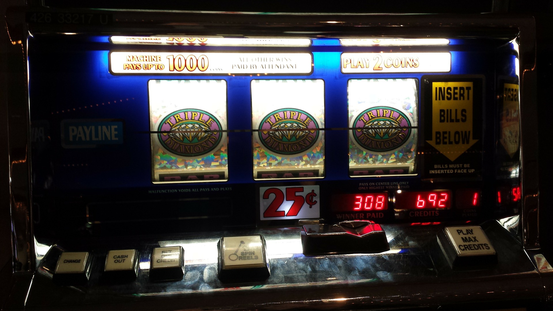 How do slot machines pay out