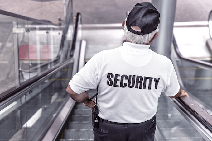 Security guard on an escalator [Casino Safety]