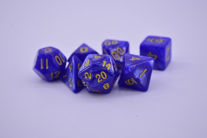 A set of 4-, 6-, 8-, 10-, 12-, and 20-sided gaming dice [Roulette Wheels]