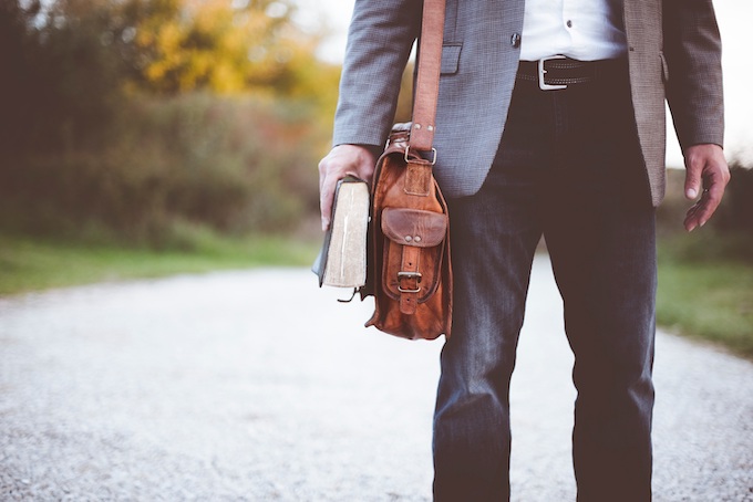Man Walking with a Messenger Bag [Keeping It]