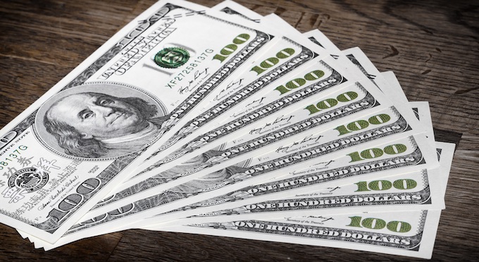 Eight U.S. $100 bills on a table [5 Spin Method]